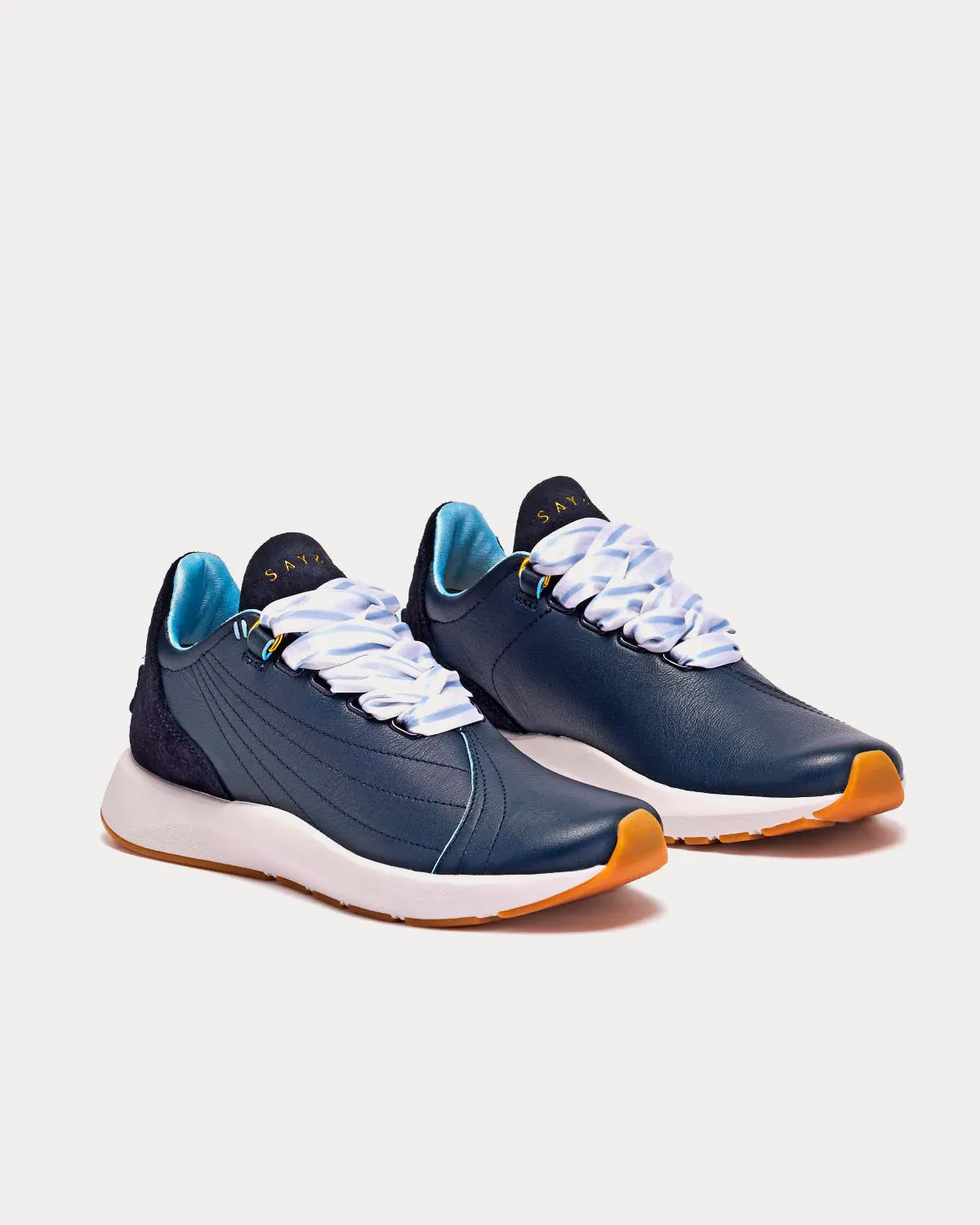 Two Navy Low Top Sneakers